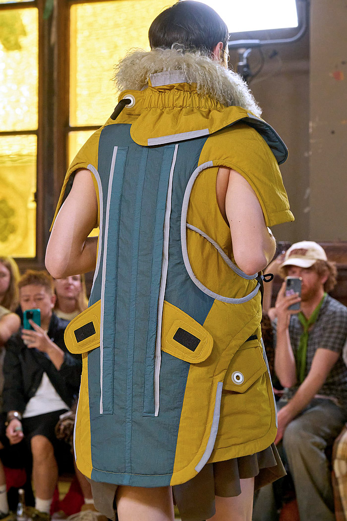 Craig Green 2026 Spring Summer Mens Runway - Vest, Straps, Fred Perry Collab, Knit Fringes, Skirt Shorts, Flowers, and Rainwear