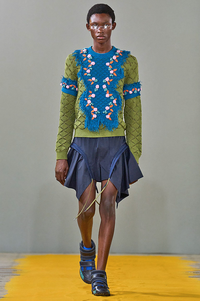 Craig Green 2026 Spring Summer Mens Runway - Vest, Straps, Fred Perry Collab, Knit Fringes, Skirt Shorts, Flowers, and Rainwear