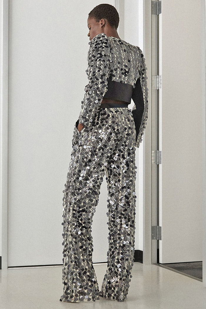 Greta Constantine 2026 Spring Summer Womens at NYFW - coveralls, sequins, flare, sheer, embroidered swirls, ruffles, peplum, cape