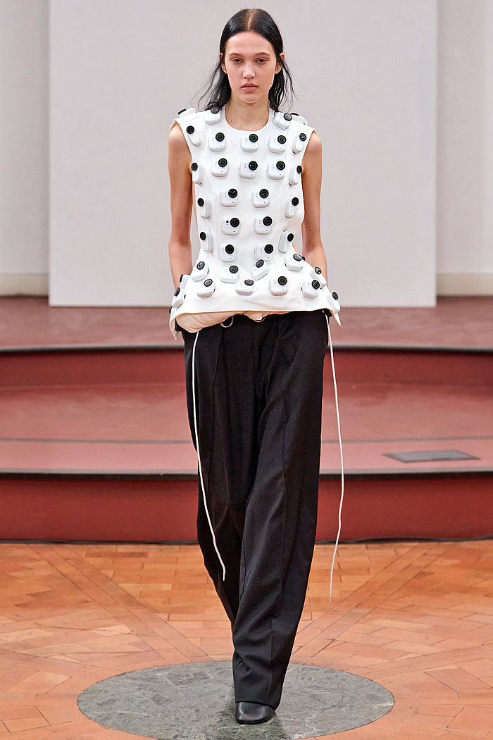 Institution By Galib Gassanoff 2026 Spring Summer Womens at MFW - basket weave, shoelace fringes, buttons, cameras, high shoulders