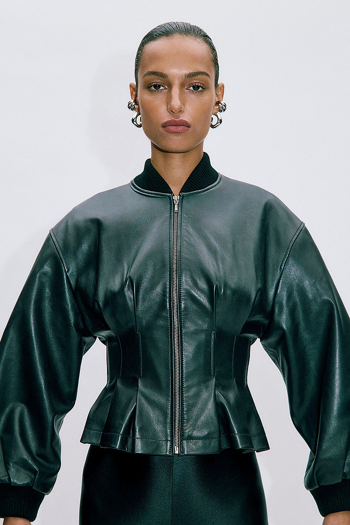 Hervé Léger 2026 Spring Summer Womens at NYFW showed bodycon bandage dress, sheer wraps, stripes, shirred waist, disco fringes