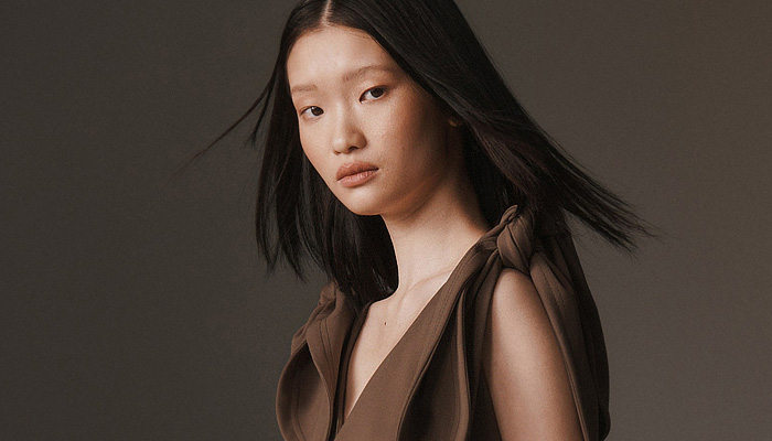 Monse 2026 Resort Cruise Pre-Spring Womens Lookbook - Denim Jeans Deconstructed Hybrid Vest Asymmetrical Knit Sweater Jumper Metal Studs Patchwork Cardigan Blouse Shirtdress Pinstripe Leather Sweatshirt Hoodie Harness Check Blazerdress Pockets Belts Straps Miniskirt Balloon Skirt Shorts Double Collar Suede Quilted Puffer Outerwear Jacket Zipper Slashed Wide Leg Baggy Loose Vest Draped Knot Tied Dress Velvet Flats Clogs Loafers