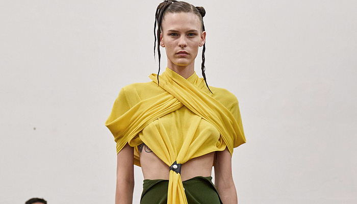 Setchu by Satoshi Kuwata 2026 Spring Summer Womens Runway Collection - Zimbabwe Batoka Tribe Basket Weave Palm Fronds Fringes Spikes Halterneck Khaki Draped Miniskirt Cross Wrap Cuffs Crop Top Midriff Zipper Folds Knit Buttons Stripes Plaid Check Cinch Drawstring String Fish Maxi Dress Denim Jeans Wide Leg Baggy Loose Blazer Jacket Accordion Pleats Corduroy Tied Pockets Shorts Basket Sandals