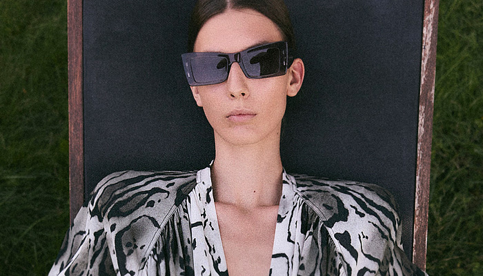 Stella McCartney 2026 Resort Cruise Pre-Spring Womens Lookbook - Denim Jeans Laces Patchwork Hybrid Wired Neckline Strapless Draped Dress Flowers Floral Body Contour Sculpture Twist Tied Bedazzled Sequins Leotard Animal Spots Ocelot Pattern Frankenstein Shoulders Turtleneck Blouse Shorts Bomber Jacket Wide Leg Palazzo Pants Cargo Pants Pockets Cinch Pleats Metallic Knit Cardigan Sweater Blazer Pantsuit Embroidery Handbag