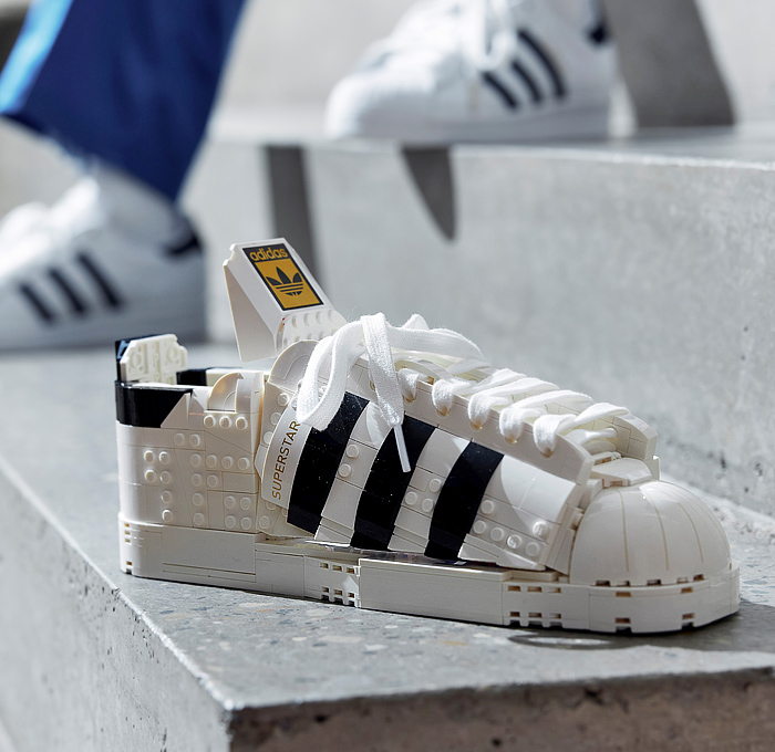 LEGO adidas Originals Superstar Sneakers Collaboration - Vintage Classic Iconic Basketball Sport Shoes Footwear LEGO Bricks White Kicks Black Stripes Low Cut Top Old Skool Toy Gold Foil Accents Laces - 2021 Spring Summer Collection - Quirky Fashion Finds by Denim Jeans Observer