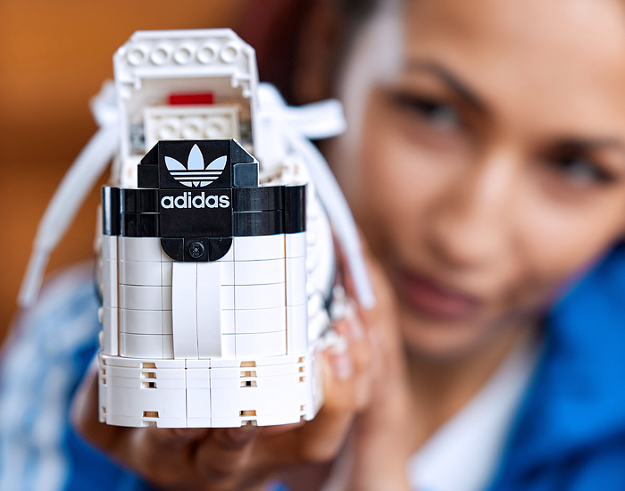 LEGO adidas Originals Superstar Sneakers Collaboration - Vintage Classic Iconic Basketball Sport Shoes Footwear LEGO Bricks White Kicks Black Stripes Low Cut Top Old Skool Toy Gold Foil Accents Laces - 2021 Spring Summer Collection - Quirky Fashion Finds by Denim Jeans Observer