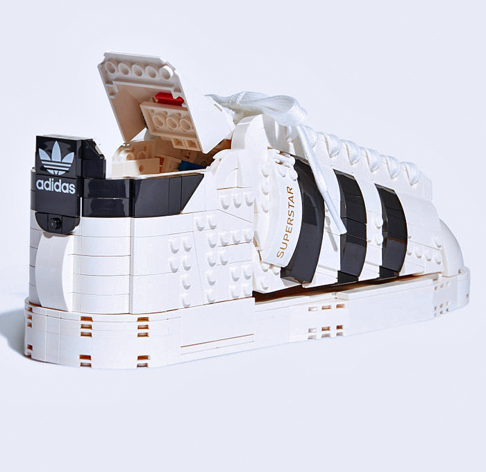 LEGO adidas Originals Superstar Sneakers Collaboration - Vintage Classic Iconic Basketball Sport Shoes Footwear LEGO Bricks White Kicks Black Stripes Low Cut Top Old Skool Toy Gold Foil Accents Laces - 2021 Spring Summer Collection - Quirky Fashion Finds by Denim Jeans Observer