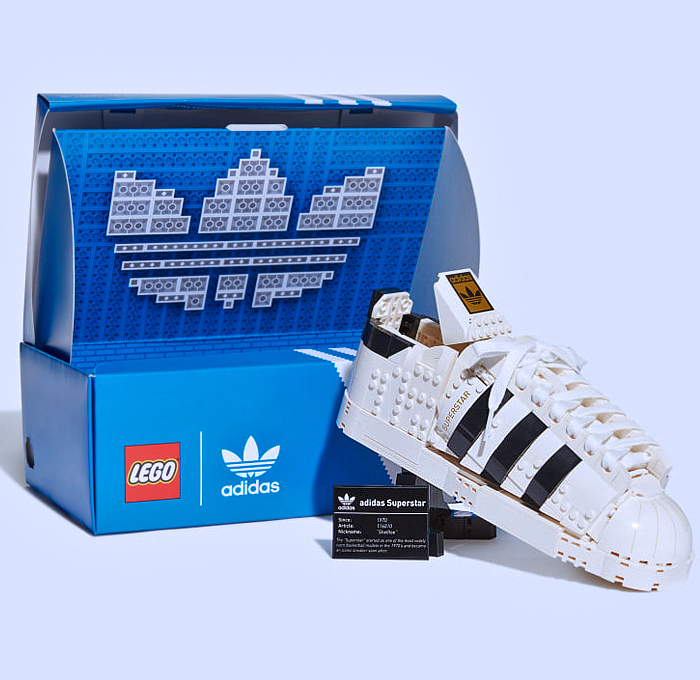 LEGO adidas Originals Superstar Sneakers Collaboration - Vintage Classic Iconic Basketball Sport Shoes Footwear LEGO Bricks White Kicks Black Stripes Low Cut Top Old Skool Toy Gold Foil Accents Laces - 2021 Spring Summer Collection - Quirky Fashion Finds by Denim Jeans Observer