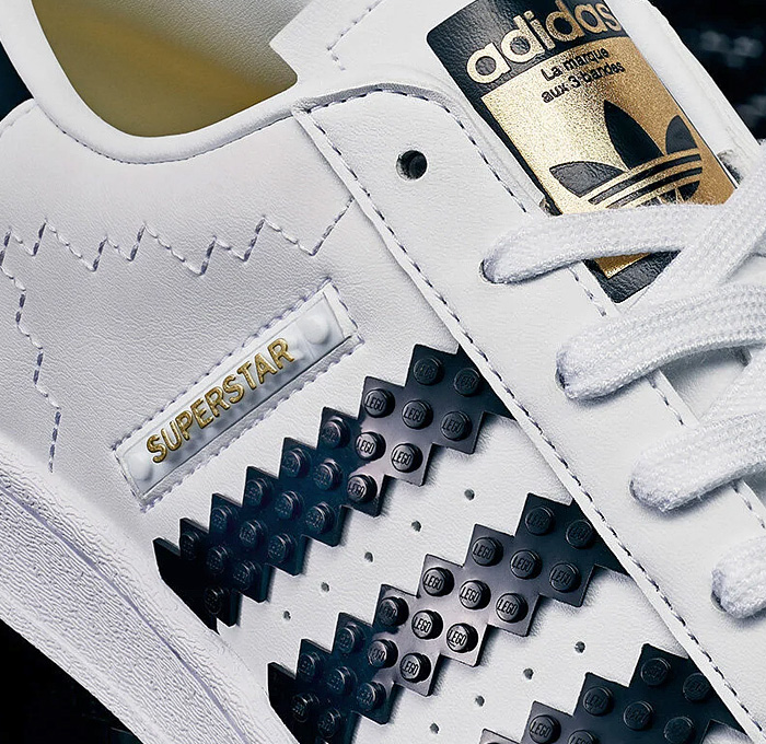 LEGO adidas Originals Superstar Sneakers Collaboration - Vintage Classic Iconic Basketball Sport Shoes Footwear LEGO Bricks White Kicks Black Stripes Low Cut Top Old Skool Toy Gold Foil Accents Laces - 2021 Spring Summer Collection - Quirky Fashion Finds by Denim Jeans Observer