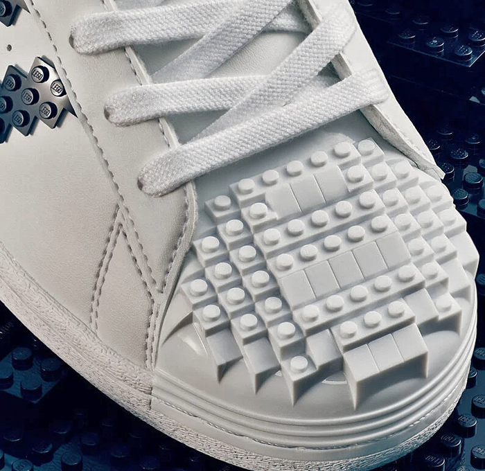 LEGO adidas Originals Superstar Sneakers Collaboration - Vintage Classic Iconic Basketball Sport Shoes Footwear LEGO Bricks White Kicks Black Stripes Low Cut Top Old Skool Toy Gold Foil Accents Laces - 2021 Spring Summer Collection - Quirky Fashion Finds by Denim Jeans Observer