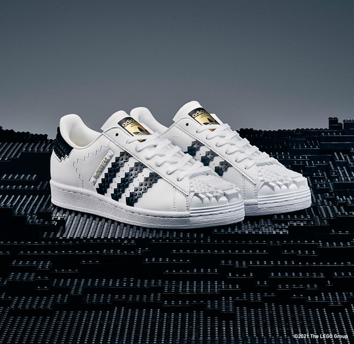 LEGO adidas Originals Superstar Sneakers Collaboration - Vintage Classic Iconic Basketball Sport Shoes Footwear LEGO Bricks White Kicks Black Stripes Low Cut Top Old Skool Toy Gold Foil Accents Laces - 2021 Spring Summer Collection - Quirky Fashion Finds by Denim Jeans Observer