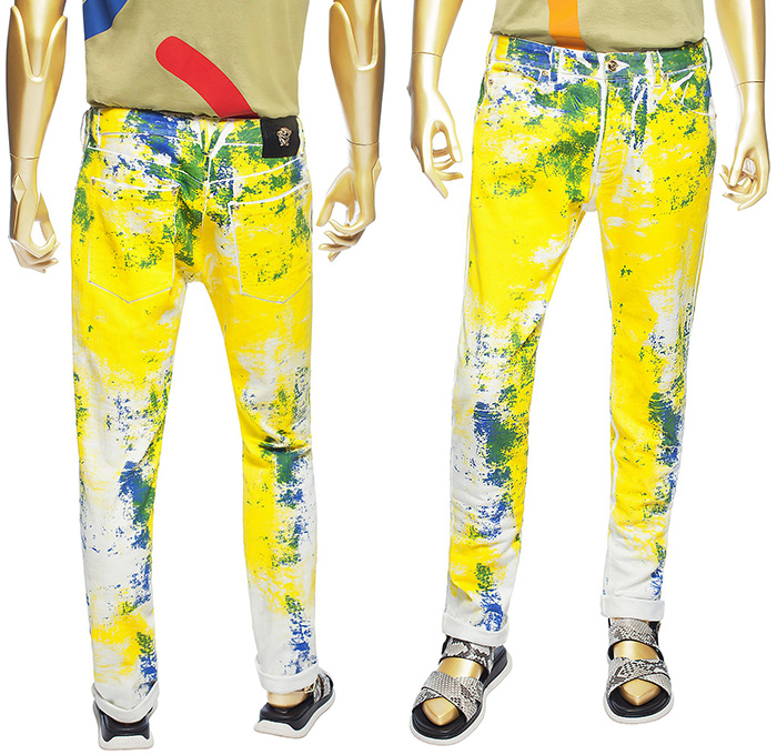 Versace Marilyn By Bert Stern Painted Denim Jeans in Orange Gold or Yellow - Paint Artwork Splatters Spills Brushed Abstract Grunge Over White Jeans - 2014 Spring Summer Mens Denim Jeans Trend Watch Fashion Style